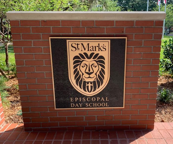 bronze plaques at saint marks episcopal day school lion emblem